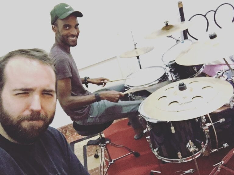 Chaz Chambers studying drum set with Cuban drummer Karel Ramos in Cuba
